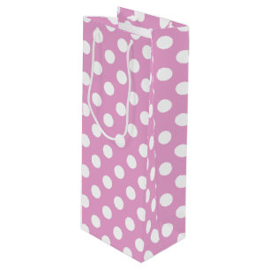 White polka dots på blekens rosa