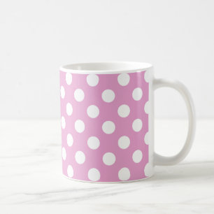 White polka dots på blekens rosa kaffemugg