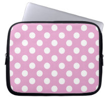 White polka dots på blekens rosa