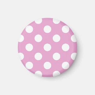 White polka dots på blekens rosa magnet
