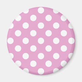 White polka dots på blekens rosa magnet