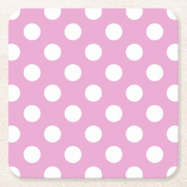 White polka dots på blekens rosa underlägg papper kvadrat