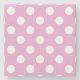 White polka dots på blekens rosa underlägg sten