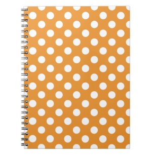 White polka dots på gula anteckningsbok med spiral
