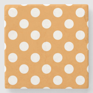 White polka dots på gula underlägg sten