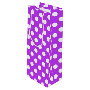 White polka dots på lila