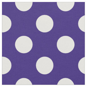 White polka dots på mörk blått tyg