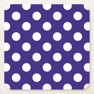 White polka dots på mörk blått underlägg papper kvadrat