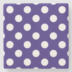 White polka dots på mörk blått underlägg sten