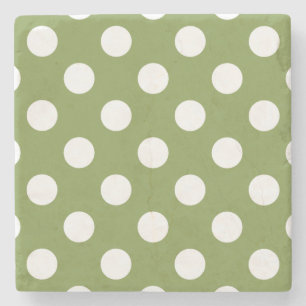 White polka dots på oliv grönt stenunderlägg