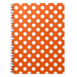 White polka dots på orange anteckningsbok med spiral