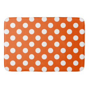 White polka dots på orange badrumsmatta