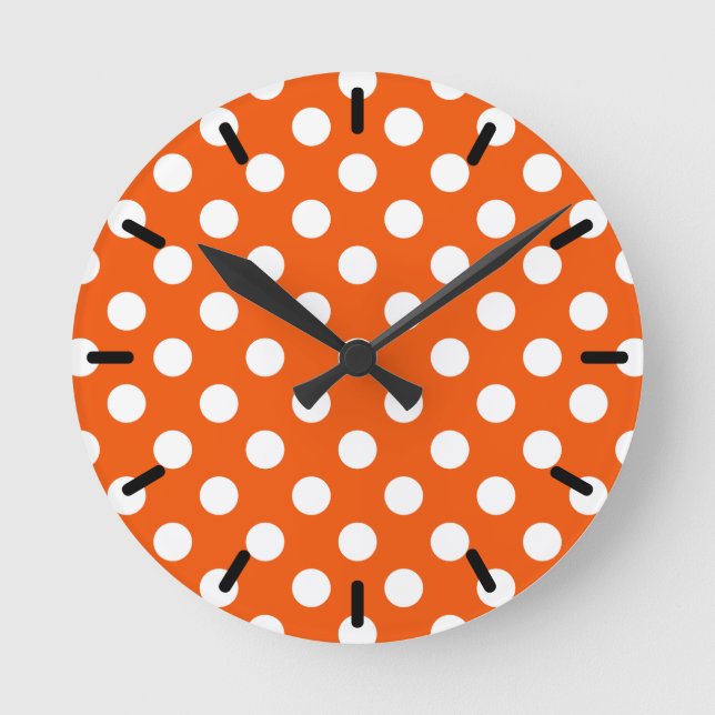 White polka dots på orange rund klocka (Framsida)