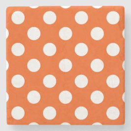 White polka dots på orange stenunderlägg