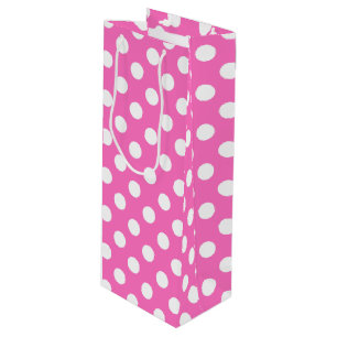 White polka dots på rosa