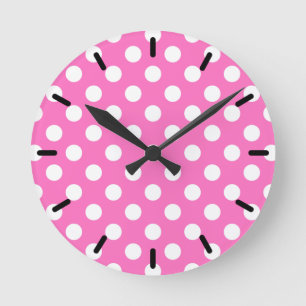 White polka dots på rosa rund klocka