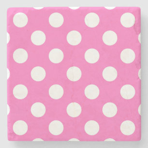 White polka dots på rosa underlägg sten