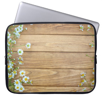 Wildblommor, örter: träbakgrund. laptop fodral