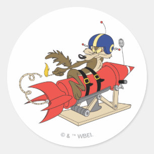 WILE E. COYOTE™ Lanserar Röd Raket Runt Klistermärke