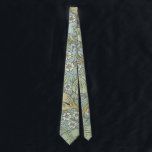 William Morris Vår Thicket: Antique Blommigt Slips<br><div class="desc">Ta in den tidlösa elegansen av rörelsen Arts and Crafts i ditt hem med det här krävande blommönstret. Designad av den brittiska textil- och tapet-designern William Morris från 1800-talets berömd har Vår Thicket mönster en vacker utformning av blått och grönt. Denna fantastiska utformning av blommigten, med dess milda snurrande löv...</div>