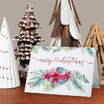 Winter Foliage Poinsettia Watercolor Garland Helgkort<br><div class="desc">Personlig julkort med elegant-kalligrafi och söt vinterträdgård för blommigt. Vattenfärgsformgivningen har poinsetter med vintern blad, bär och gräs. God jul är handskrivet och knutet till ett kärlek-hjärta. Inuti finns det en gräs träd-skog i gräns och mallen har konfigurerats för att du ska kunna lägga till ditt meddelande. På baksidan finns...</div>