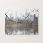 Winter in Central Park Lake New York City Skyline Pussel<br><div class="desc">Puzzle features an original photograph of a winter's day in Central Park, with a bare tree branch in the foreground and the lake and skyline of Central Park South in the distance. Lots of additional illustrated and photo puzzles are also available from this shop. If you don't see the puzzle...</div>