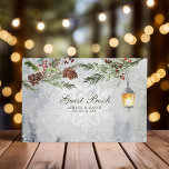 Winter Rustic Gräs Träd Lantern Botanical Bröllop Gästböcker<br><div class="desc">Fånga den mysiga ambitionen med ert vinterbröllop med den här fantastiska gästen bok. Den här gästen bok är försedd med en rustik vattenfärgsdesign som innehåller stora gräs träd, en varm ljusglöd och ömtåliga botaniska accenter, och har ett charmerande utrymme för nära och kära att sina goda önskemål och hjärtliga budskap....</div>