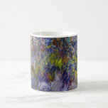 Wisteria (lämnat hälften) av Claude Monet Kaffemugg<br><div class="desc">Wisteria (1917-1920), som leddes av Claude Monet, är en vintage av bra konst som fortfarande är en blommigt som består av den lämnat halvan av en större målning. En del av en serie vår-årstidsmålningar med wistera-blommor som Monet målade i sina trädgårdar i Giverny, Frankrike. Om konstnären: Claude Monet (1840-1926) var...</div>