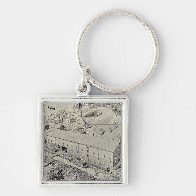 Wm G Johnson Co. Fyrkantig Silverfärgad Nyckelring (Framsidan)