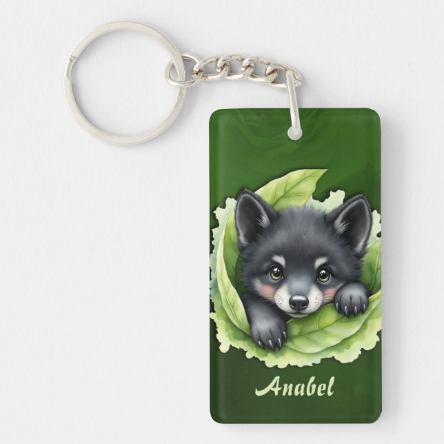 Wolf cub in the green:  (Framsidan)