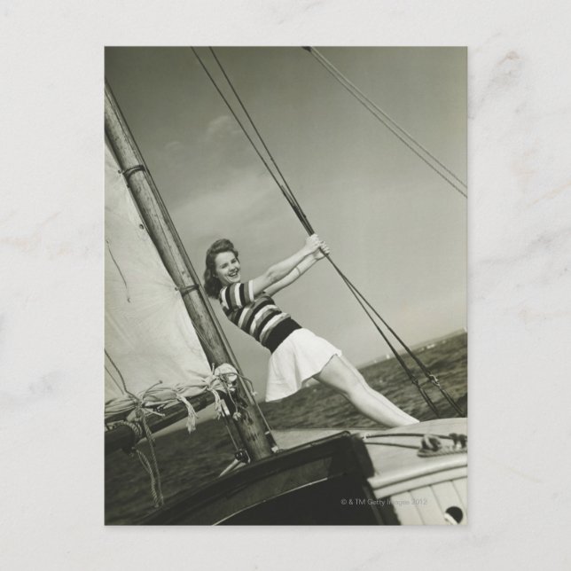 Woman Holding Rigging on Yacht Vykort (Framsida)