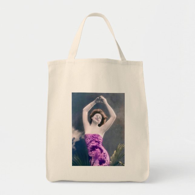woman in purple sarong , arms raised as if dancing tygkasse (Framsidan)