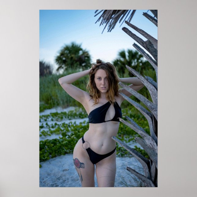 Woman Posing On The Beach In A Black Bikini Poster (Framsidan)