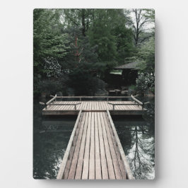 Wooden Pier framed by red Lanterns