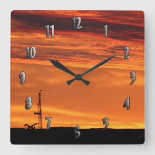 Workoverriggen på solnedgången (med numrerar), tar fyrkantig klocka
