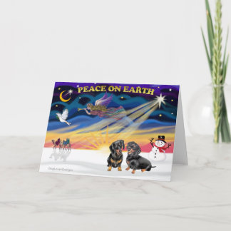 XmasSunrise-2 svart Dachshunds Helgkort