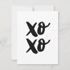 XO XO. Hus och kyssar i valentines day. Svart Julkort