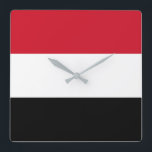 Yemen flagga fyrkantig klocka<br><div class="desc">Den Yemen flagga är en horisontaltriband. De använda färgerna i flagga är röda,  vit,  svart. Proportionera av den Yemen flagga är 2:3. Flagga av Yemen adopterades i 1990. Den första användan av strömflaggadesignen ägde rum i 1990.</div>