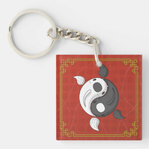 Yin och Yang i den akryliska nyckelkedjan Koi