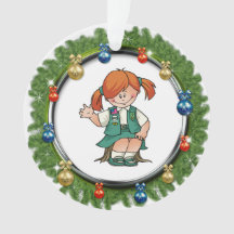 Yngre röd hårgräskran med prydnadar