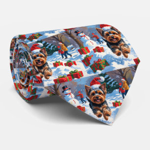 Yorkshire Terrier i snö med julhatt Slips