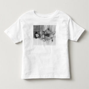 Young Boy Drappade som Cowboy med Leksak Tee Shirt