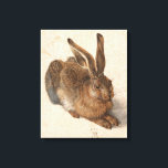 Young Hare | Albrecht Dürer Canvastryck<br><div class="desc">Albrecht Dürer’s Young Hare (1502) är en noggrant detaljerad vattenfärgsmålning som visar en verklighetstrogen bild av en hare. Konsten är känd för sin enastående realism och fångar struktur i päls, det känsliga ljuset i ögon och skuggornas subtila spel. Detta mästerverk visar Dürer förmåga att observera och hans innovativa inställning till...</div>