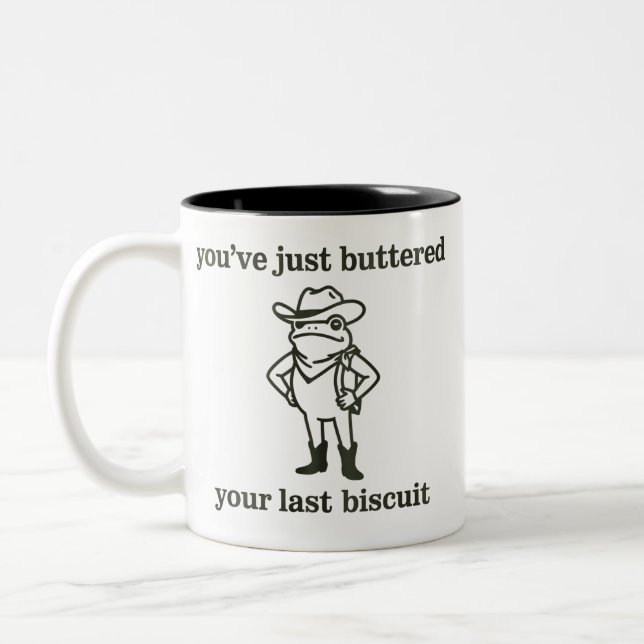 You've just Buttered Your Last Biscuit Cowboy Frog Två-Tonad Mugg (Vänster)