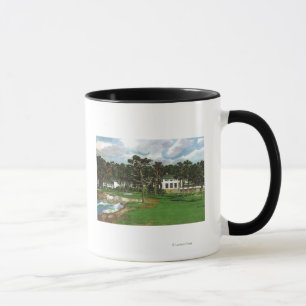Yttre beskåda av den Pebble Beach logen & Mugg