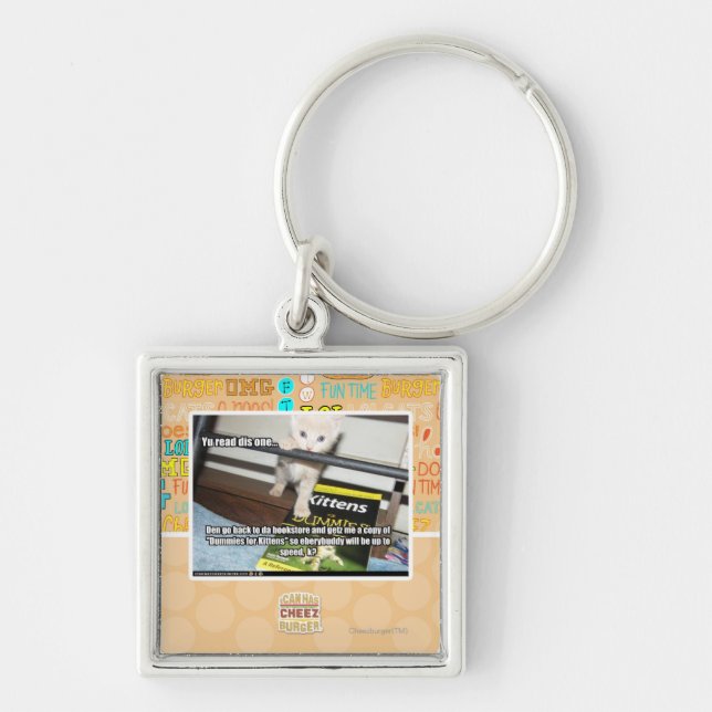 Yu röd dis en. fyrkantig silverfärgad nyckelring (Framsidan)