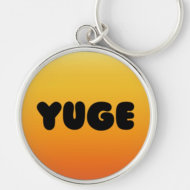 YUGE DESIGN KEYCHAIN RUND SILVERFÄRGAD NYCKELRING (Framsidan)