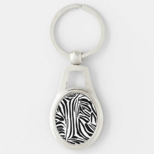 Zebra mönstrad ovalt silverfärgad nyckelring