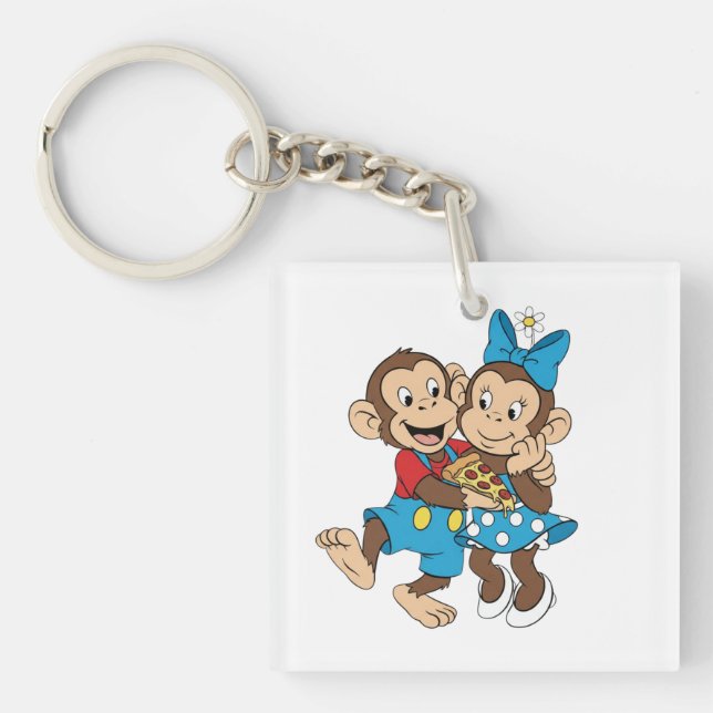 Zina and Mimo with a slice of pizza. (Framsidan)