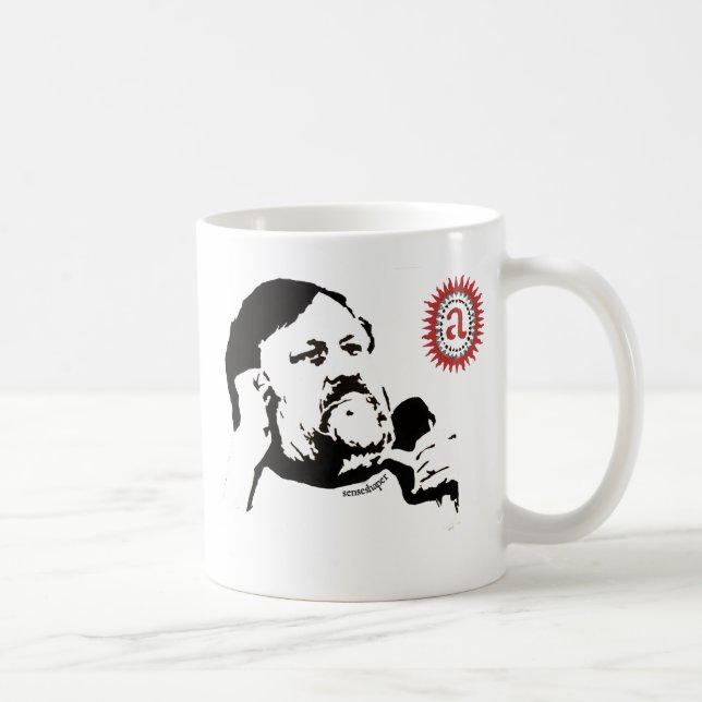 Zizek som beskådar objeten petit a: T-tröja Kaffemugg (Höger)